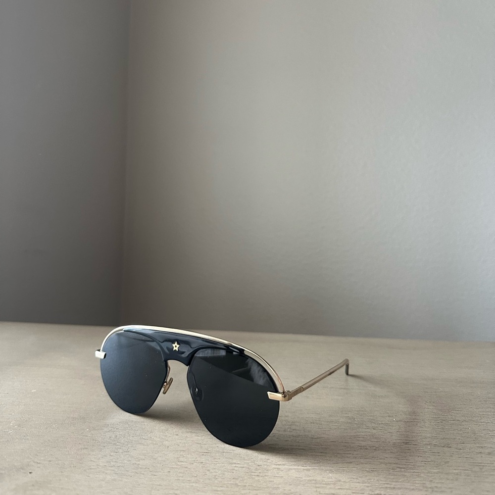 Christian Dior 2022 sunglasses that come with case and glass duster.